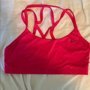Hot pink Nike strappy sports bra